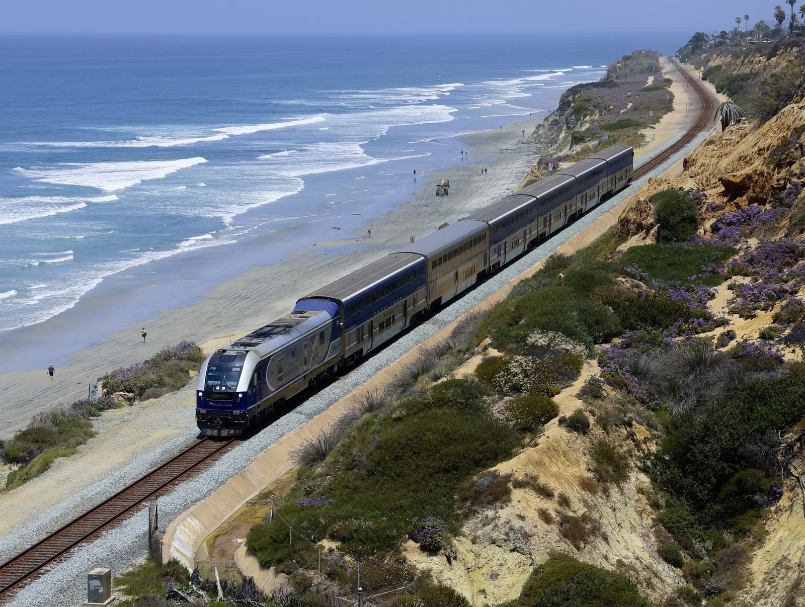 A Pacific Surfliner on the Del Mar bluffs. The coastal rail line runs along the bluff edge, where erosion threatens the tracks below.