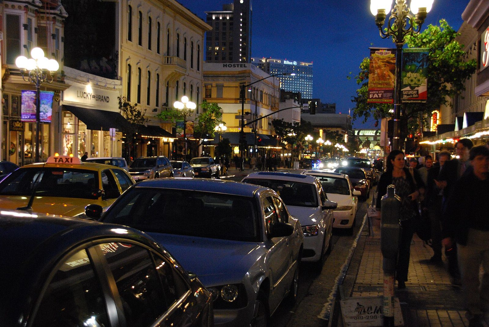 A Gaslamp Quarter street at night. The historic district anchors downtown's social life.