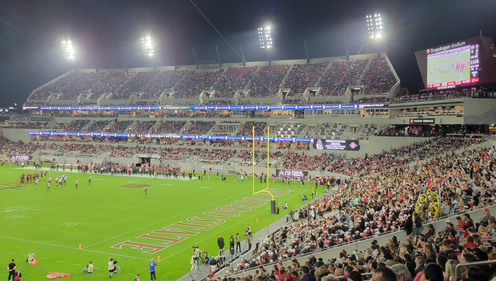 A night game at Snapdragon Stadium, with AZTECS in the end zone. San Diego State outscored Texas State 28-12 over the final two quarters.