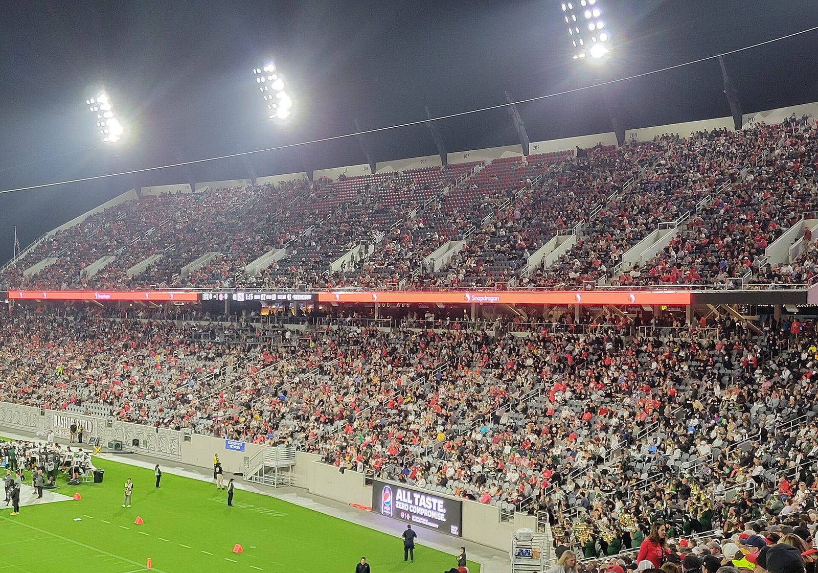 Packed stands at Snapdragon Stadium on a game night. The Aztecs led 13-0 early, trailed in the third quarter, and led again for good only in the last minute of the fourth.