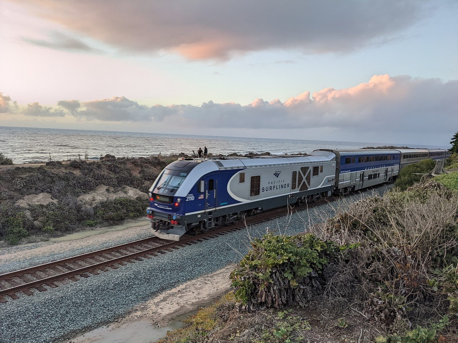 A Pacific Surfliner on the coastal line in Del Mar. The long-term plan, the LOSSAN rail realignment, would move the tracks off the bluffs, with a tunnel beneath Del Mar among the alternatives under study.