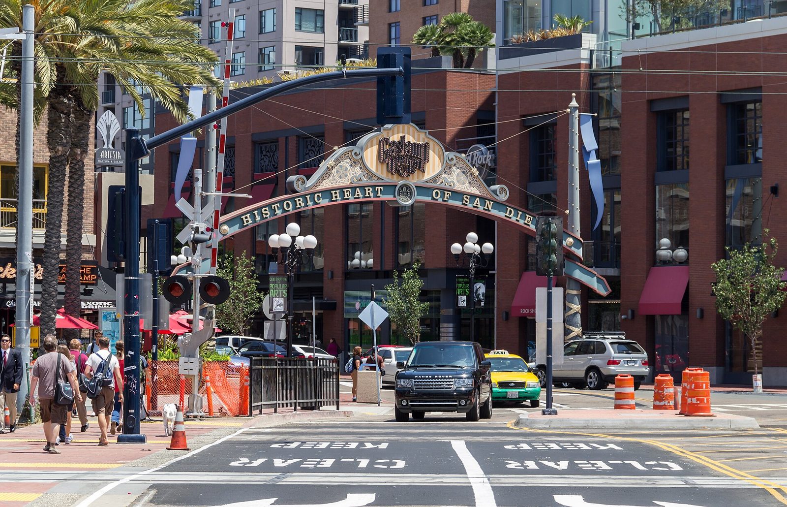 The Gaslamp Quarter arch. Downtown continues to carry a disproportionate share of the region's unsheltered population.