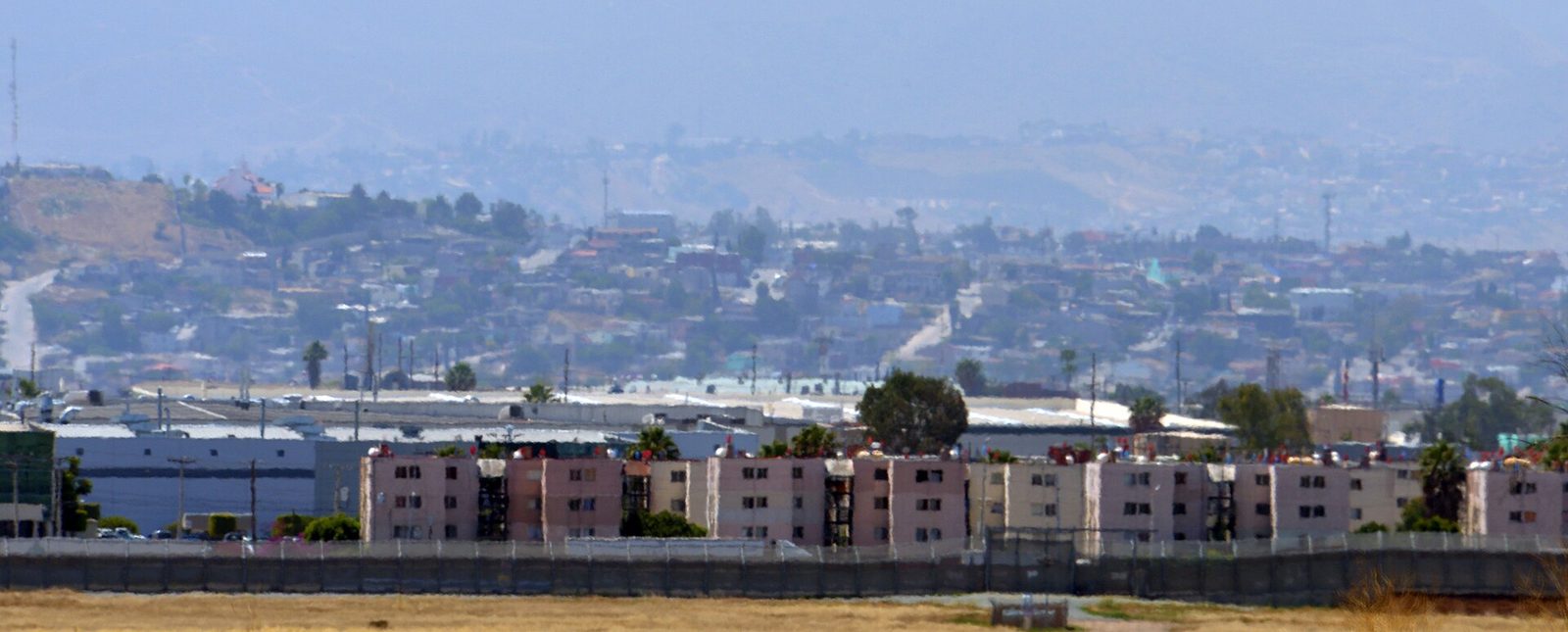 The border fence at Otay Mesa. The new crossing is designed to give commercial and passenger traffic a third option beyond San Ysidro and the existing Otay Mesa port.