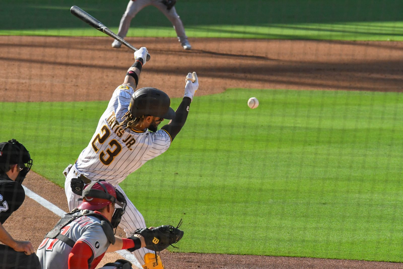 Fernando Tatis Jr. batting in a 2021 game against the Reds. His 429-foot third-inning homer off Robert Gasser on Wednesday was San Diego's only run of the night.