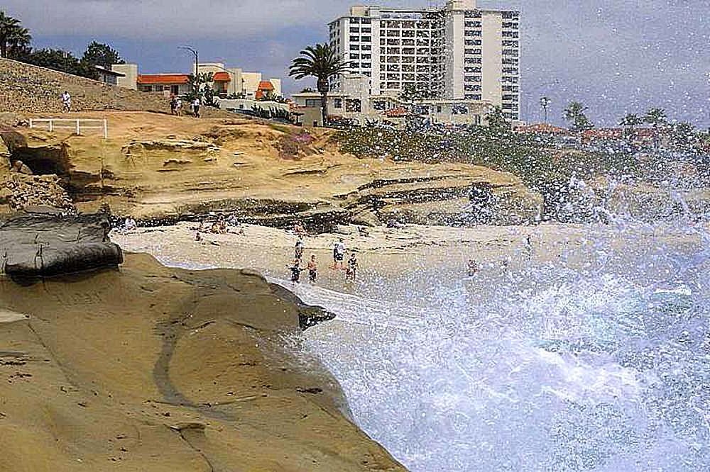 Heavy surf breaks over the rocks at La Jolla. Forecasters warned of life-threatening surf and rip currents along the Southern California coast through Monday.