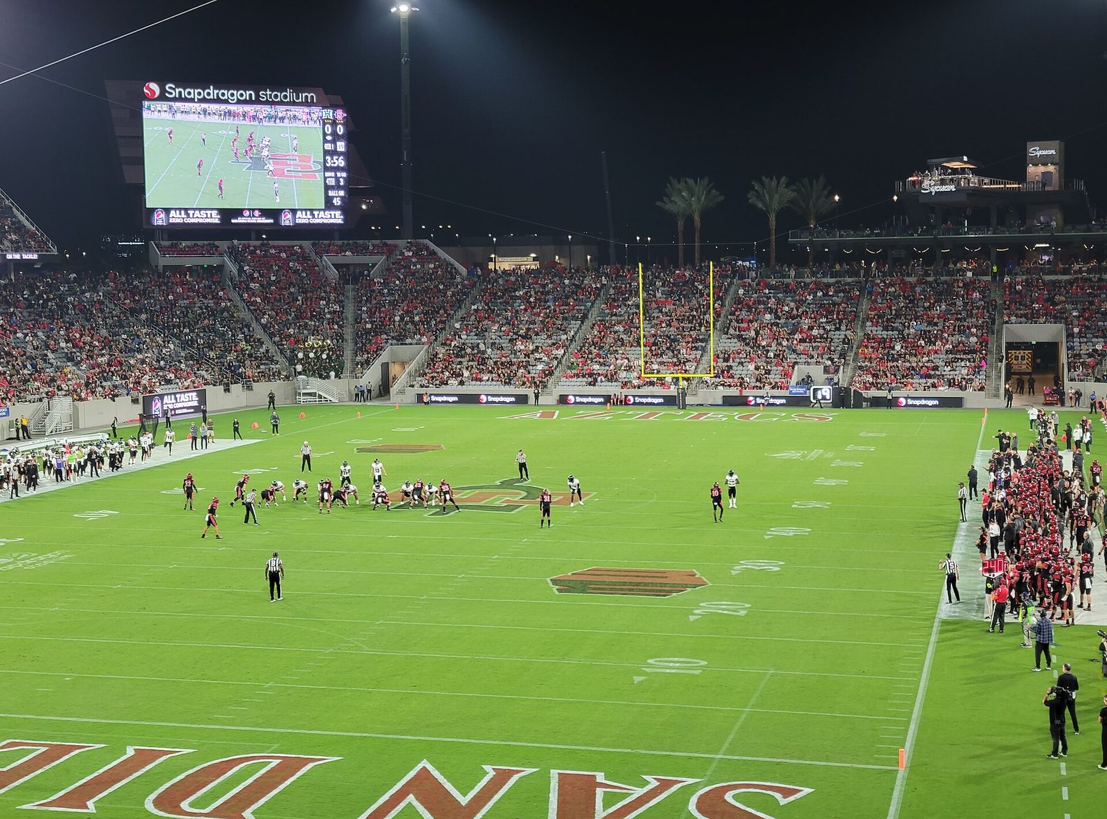 A night game at Snapdragon Stadium, with AZTECS painted in the end zone. Saturday's Pac-12 opener against Texas State is the program's first conference home game.
