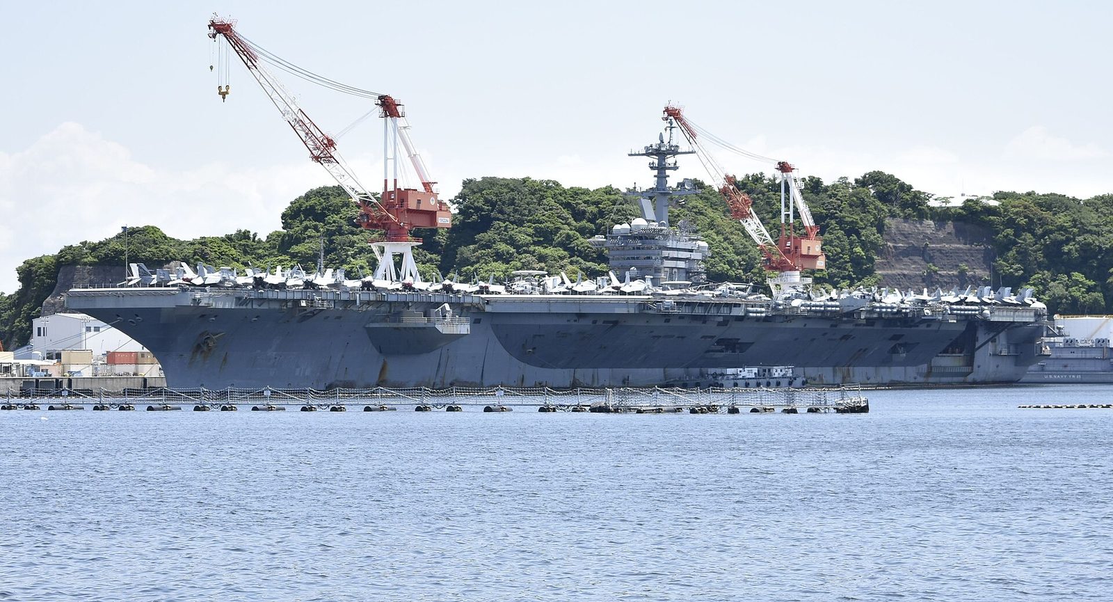 The Lincoln berthed with her air wing's aircraft packed on deck. The ship carries roughly 5,000 sailors and Marines.