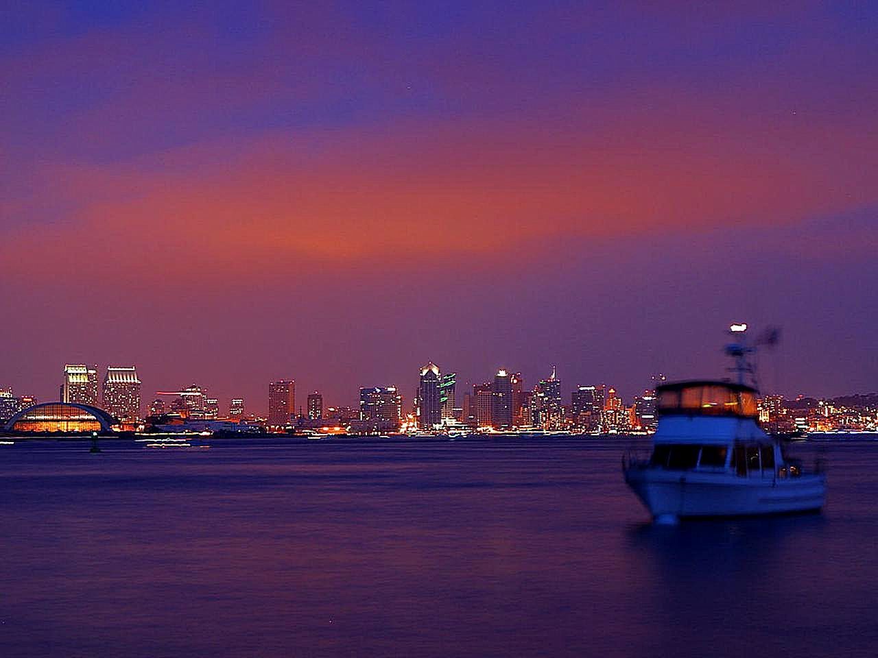 The San Diego skyline at sunset from Harbor Island. About 1.4 million people live in the city, more than 3.3 million across the metropolitan area.